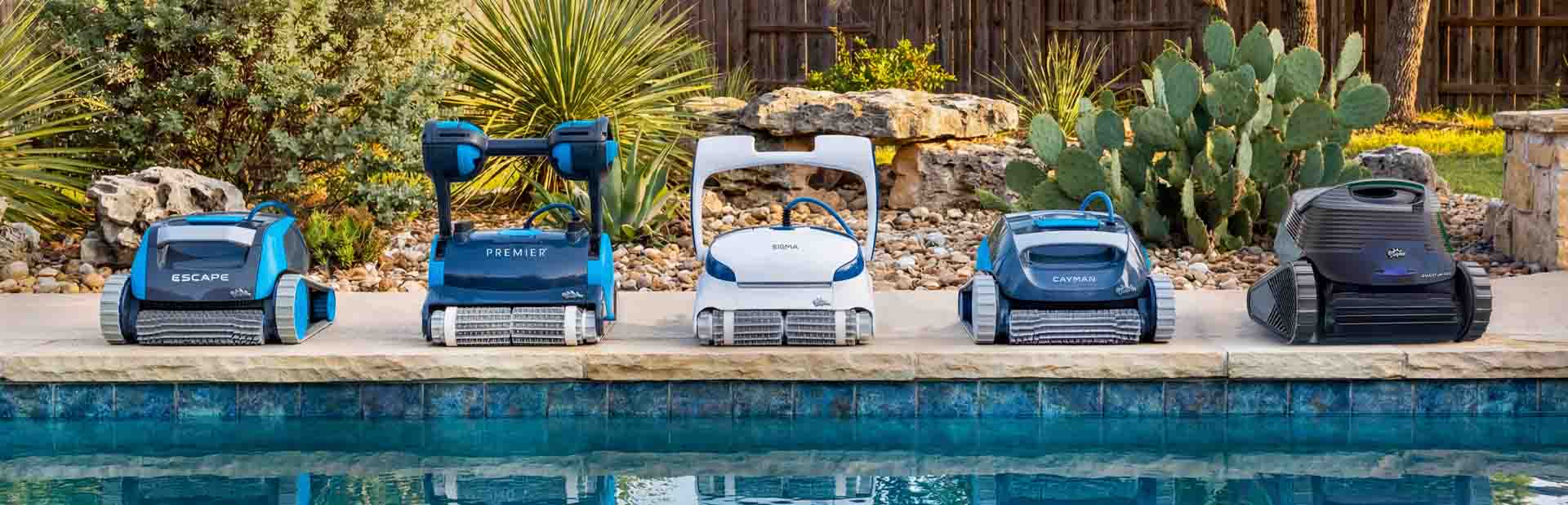 Dolphin Sigma lined up poolside with other Dolphin robotic pool cleaners