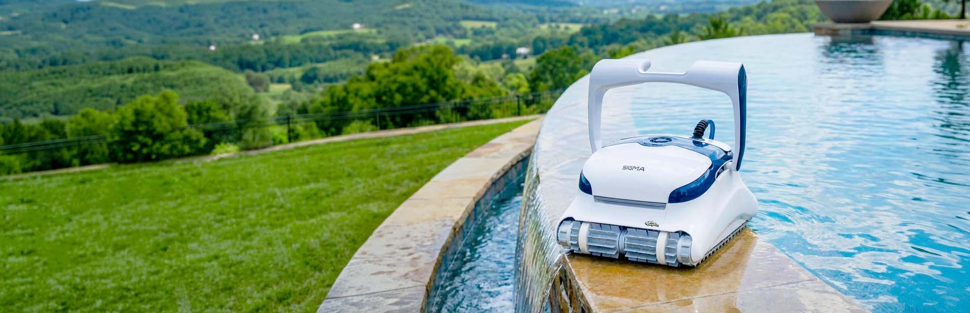 Dolphin Sigma Robotic Pool Cleaner on the edge of an infinity pool