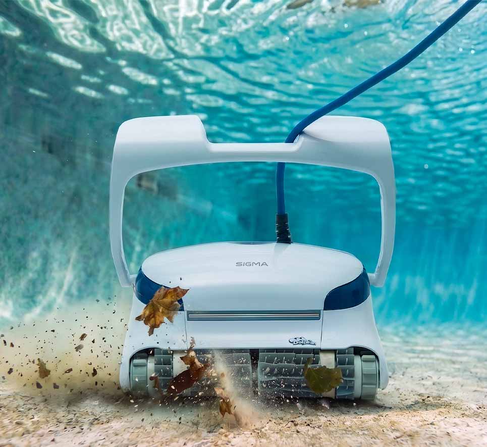 Dolphin Sigma Robotic Pool Cleaner scrubbing leaves and debris from the pool floor