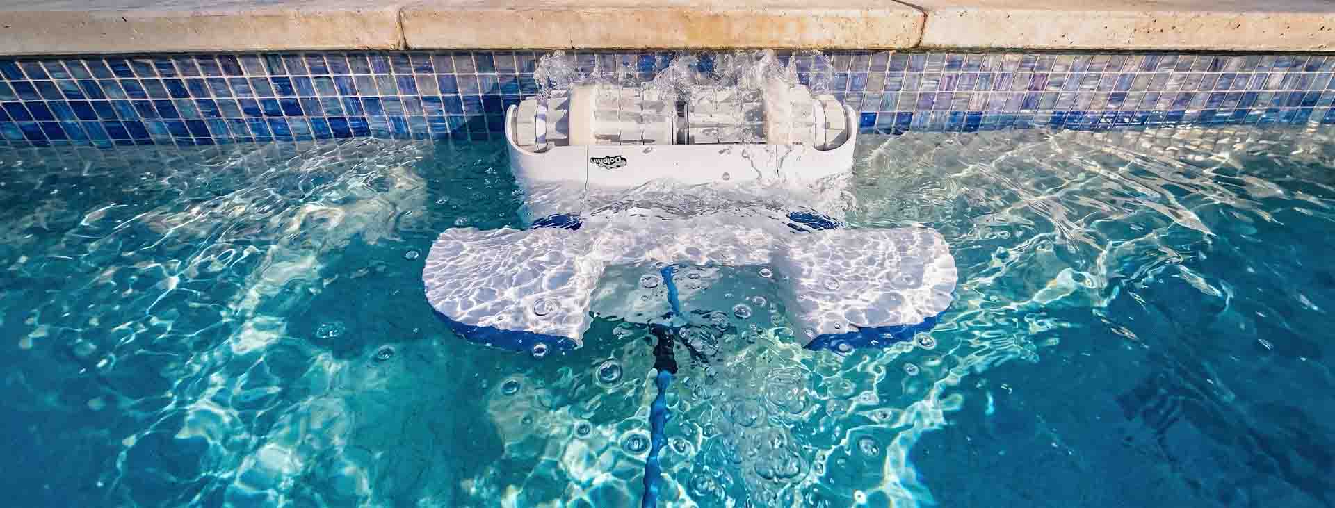Dolphin Sigma scrubbing the tile at the waterline