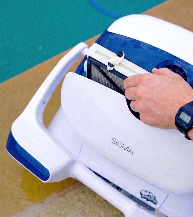 Lifting a top-loading filter cartridge out of the Dolphin Sigma