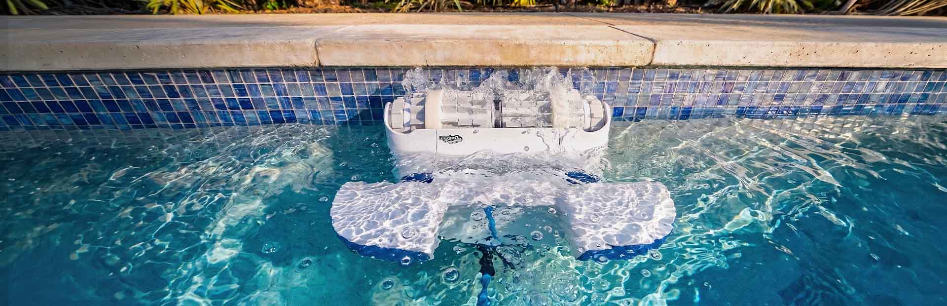 Dolphin Sigma Robotic Pool Cleaner scrubbing the waterline