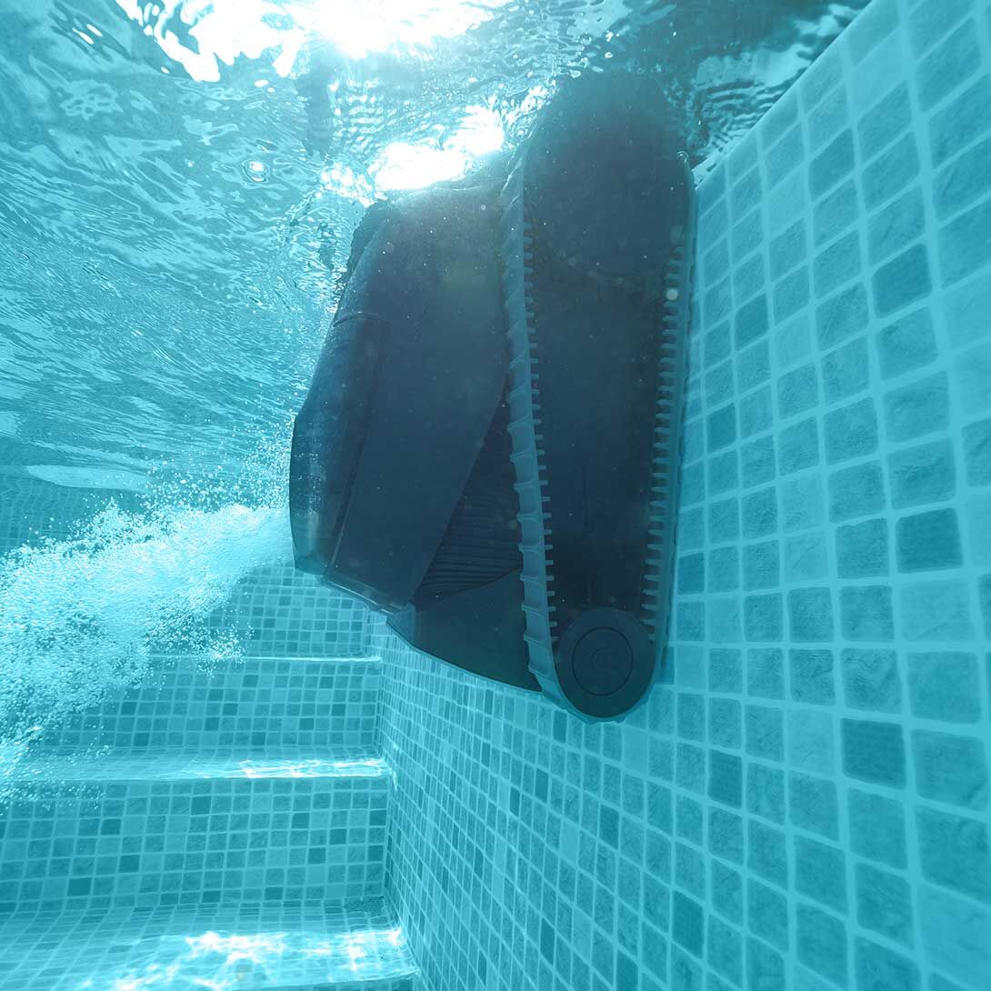 Dolphin Liberty 200 climbing a tiled pool wall beside the steps