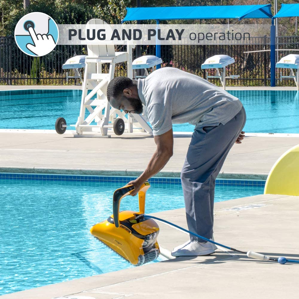 Lowering the Dolphin Wave 60 into a commercial pool