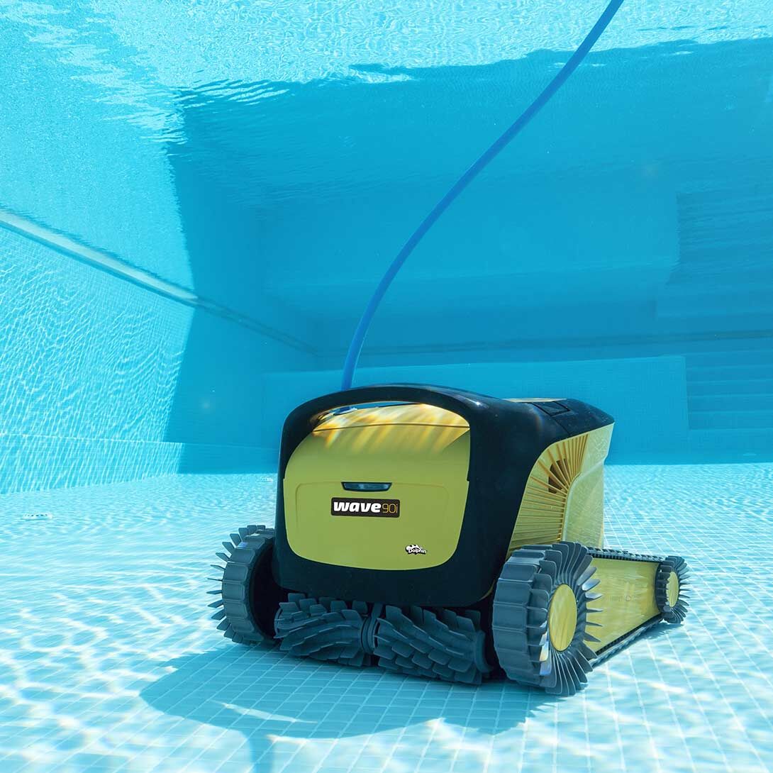 Dolphin Wave 90i cleaning a commercial pool floor